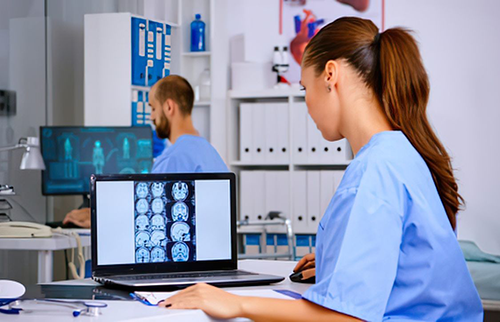 BlogPost5 neuroscience nurse practitioner checking brain scans 500px