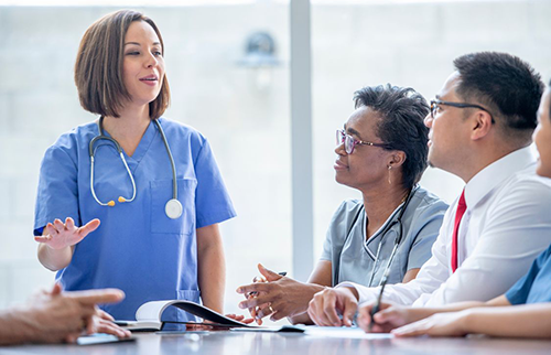 nurse-getting-support-from-other-nurses-talking-about-nursing-research-topics