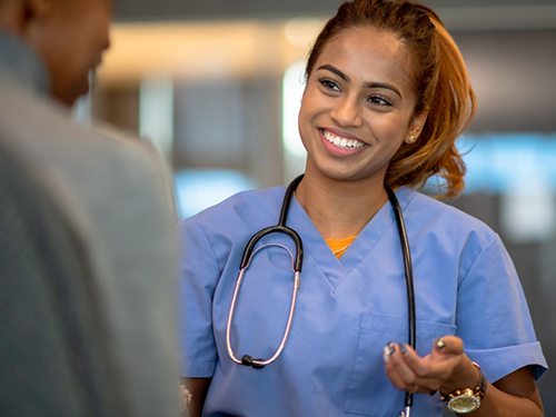BlogPost Neuroscience nurse discussing care 500px